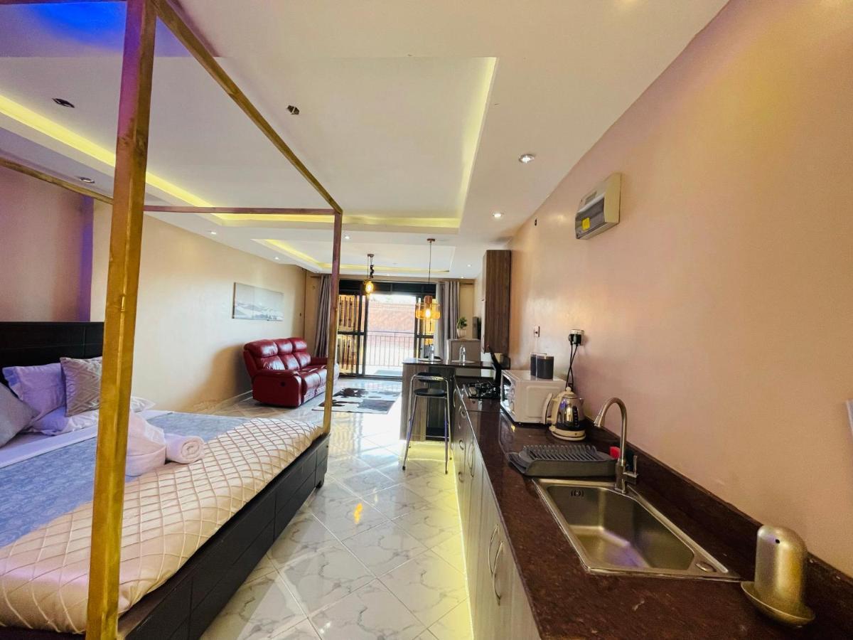 Trendy Apartments เอนเทบเบ้ ภายนอก รูปภาพ
