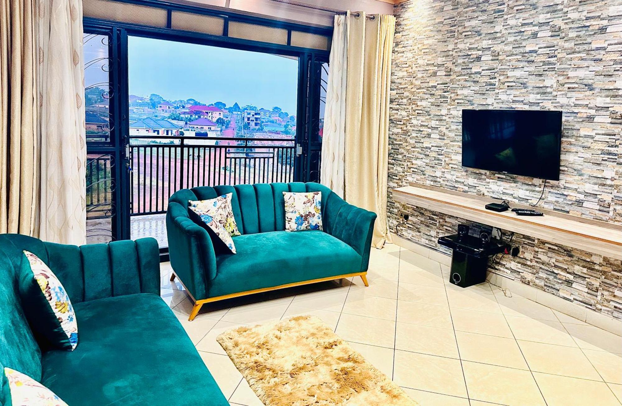Trendy Apartments เอนเทบเบ้ ภายนอก รูปภาพ